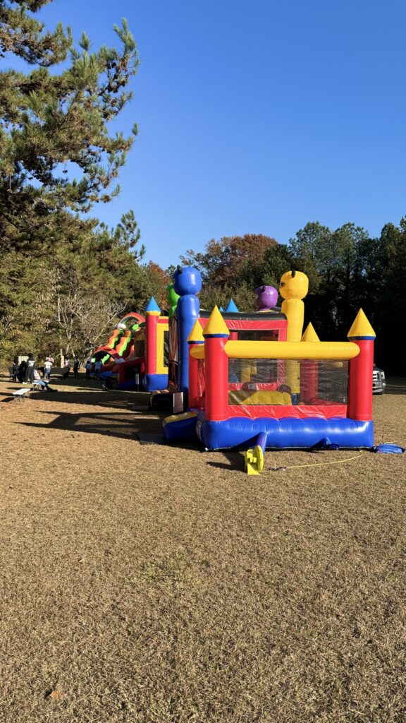 Outdoor bounce house and inflatable festival set up in Lithia Springs GA by Marques Amusement Company