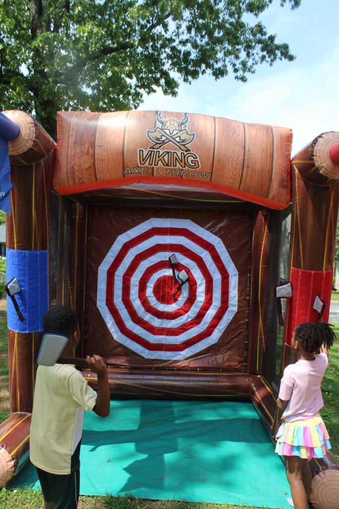 Viking axe throw interactive bounce house rentals in Hiram GA for kids and family-friendly events by Marques Amusement Company