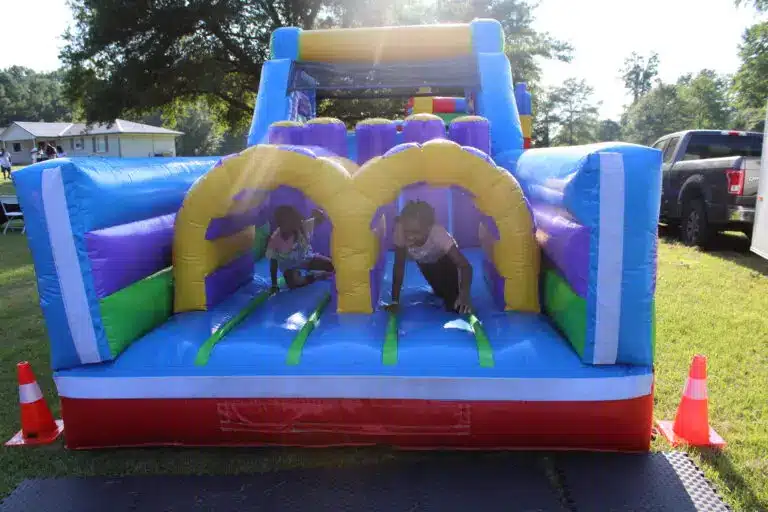 Valentine’s Day family events in Atlanta with kids enjoying inflatable activities