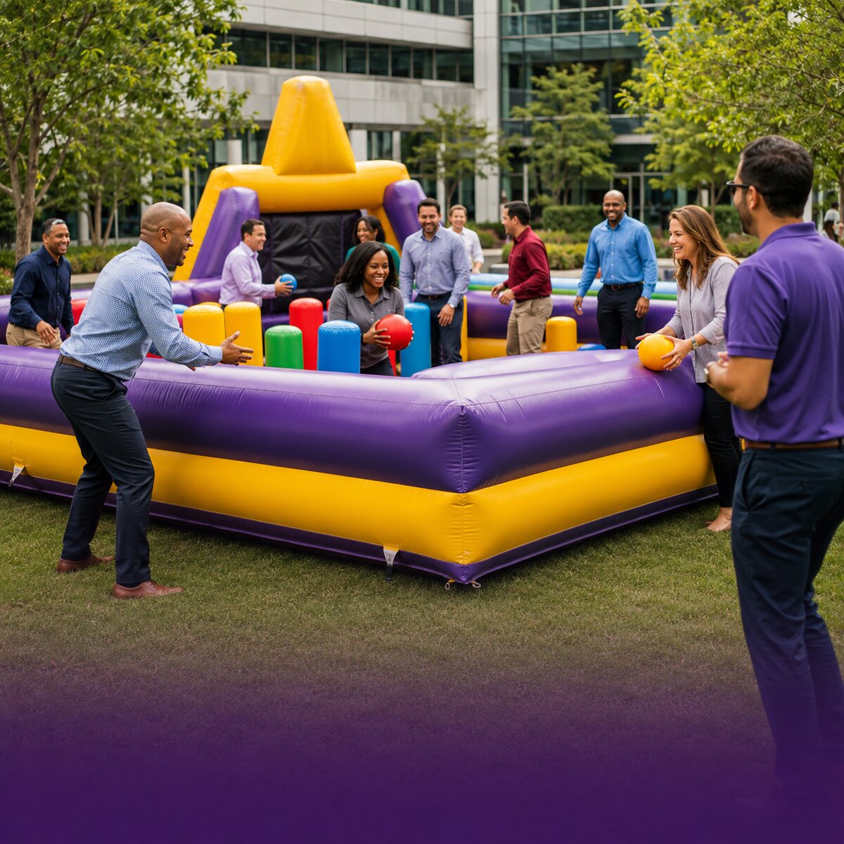 Professionals enjoying an inflatable team-building activity